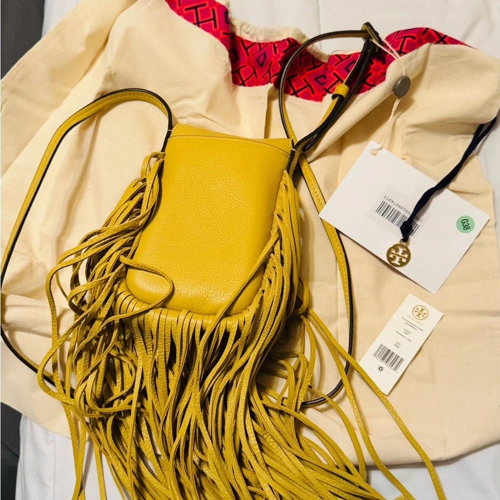 Tory Burch Mustard Yellow Fringe Crossbody bag.